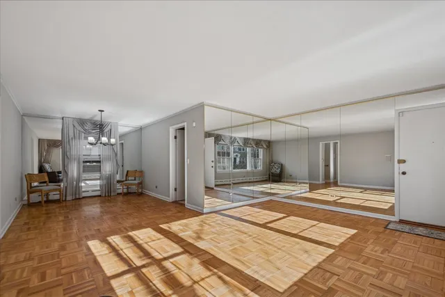 a very nice looking room with a chandelier