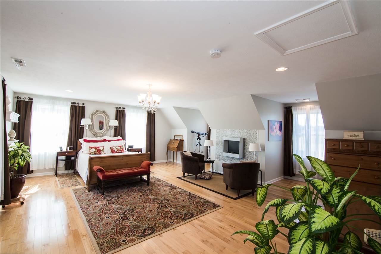 9139 Centerville Road Bridgewater, VA 22812 - Photo 38 of 50 a living room with furniture rug and wooden floor