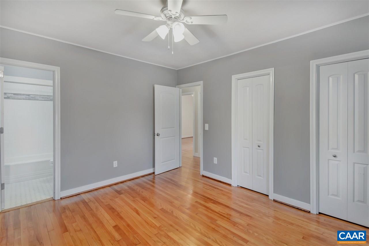442 Rio Road West Charlottesville, VA 22901 - Photo 26 of 48 a view of an empty room with wooden floor