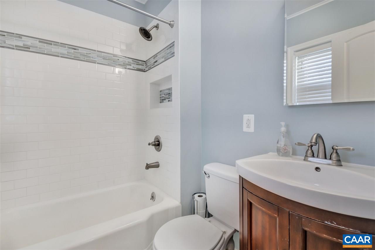 442 Rio Road West Charlottesville, VA 22901 - Photo 29 of 48 a bathroom with a sink toilet and shower