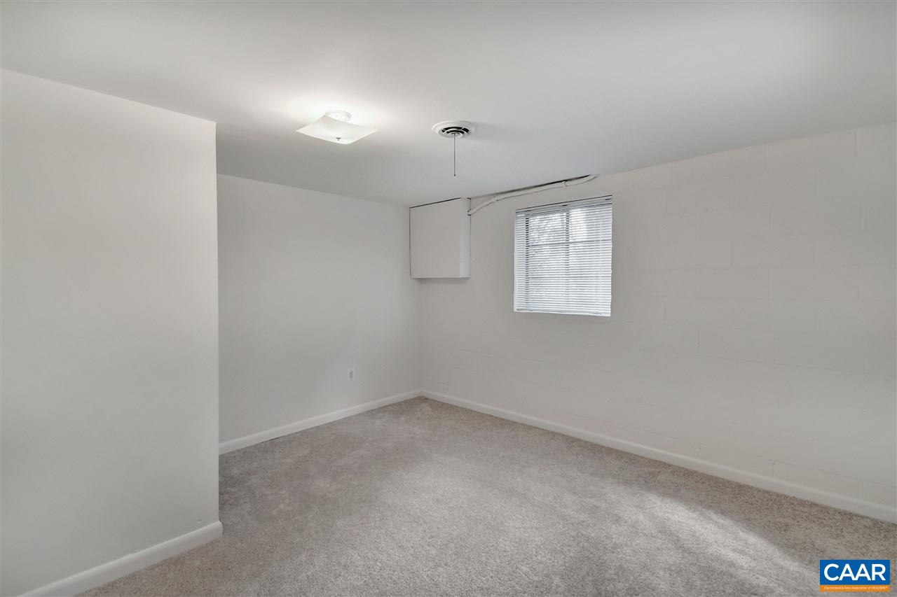 442 Rio Road West Charlottesville, VA 22901 - Photo 35 of 48 an empty room with windows