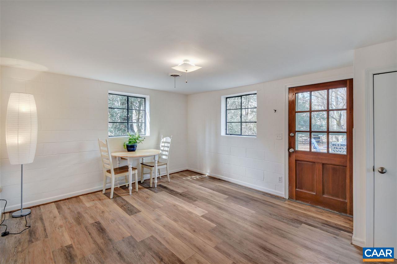 442 Rio Road West Charlottesville, VA 22901 - Photo 37 of 48 a view of a livingroom with furniture and wooden floor