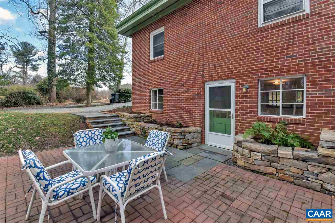 442 Rio Road West Charlottesville, VA 22901 - Photo 8 of 48 a view of backyard with seating space and trees
