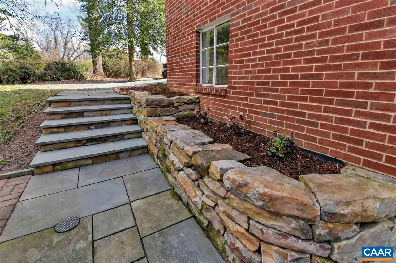 442 Rio Road West Charlottesville, VA 22901 - Photo 9 of 48 a view of a backyard with chairs