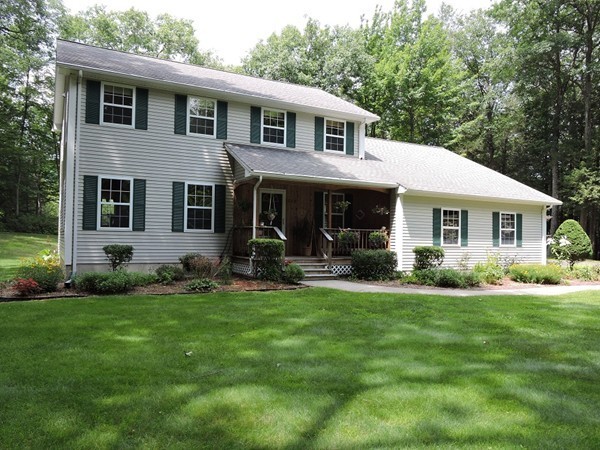 279 Main Road Westhampton, MA 01027 - Photo 3 of 22 a front view of a house with a yard and porch