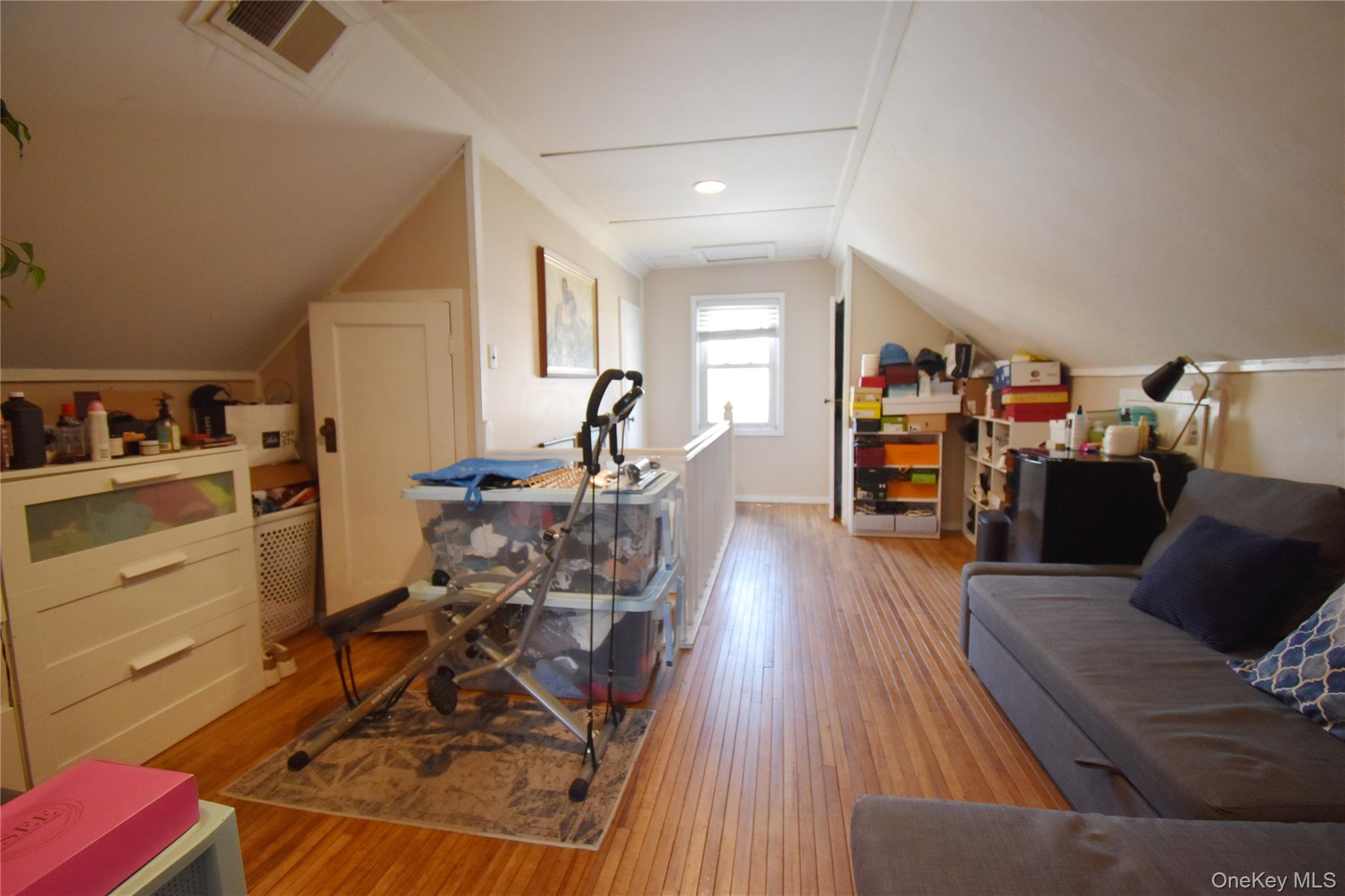 6 Sullivan Road Farmingdale, NY 11735 - Photo 12 of 21 a view of a dining room with furniture a rug and wooden floor