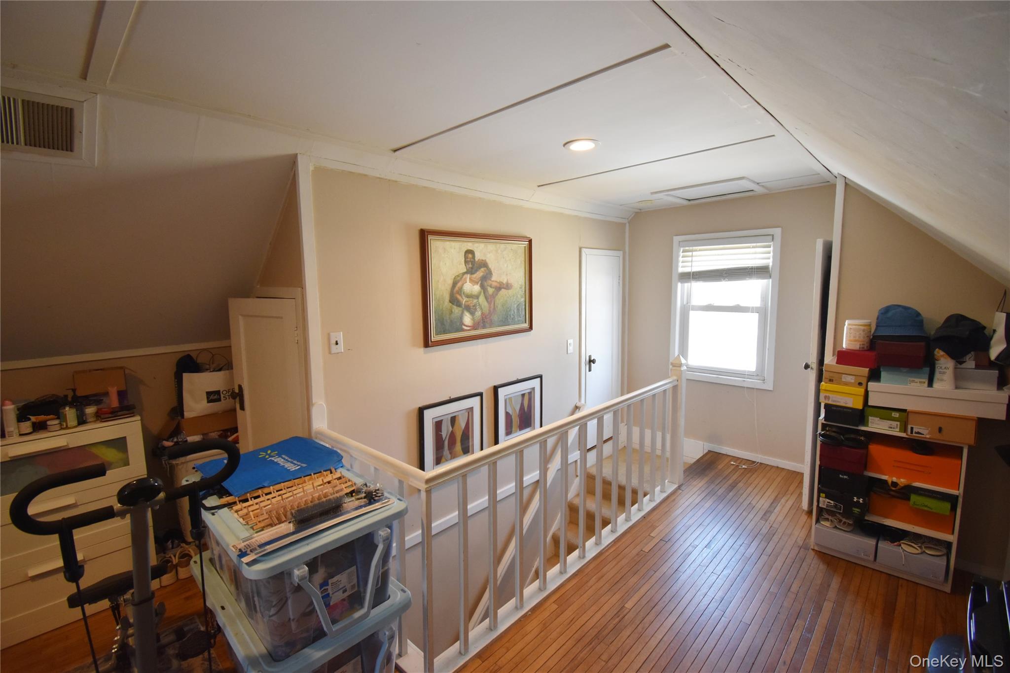 6 Sullivan Road Farmingdale, NY 11735 - Photo 13 of 21 a view of a workspace with furniture and wooden floor