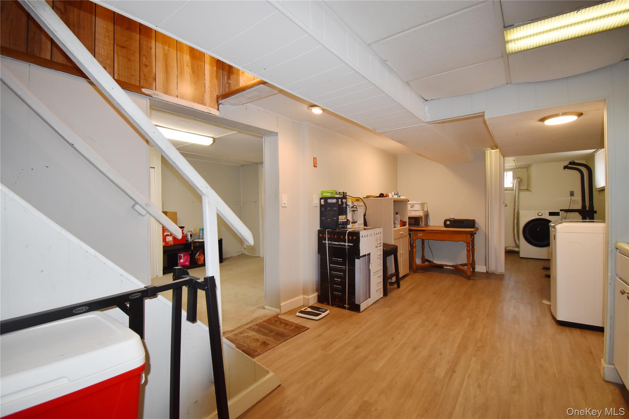 6 Sullivan Road Farmingdale, NY 11735 - Photo 17 of 21 a view of a hallway with workspace