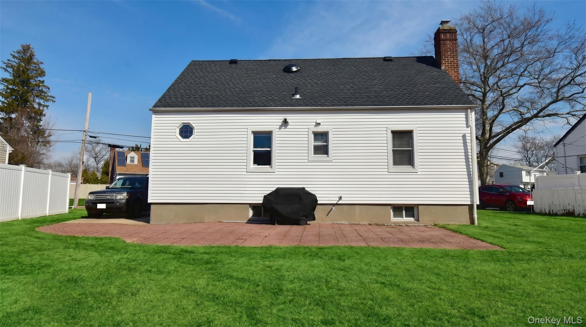 6 Sullivan Road Farmingdale, NY 11735 - Photo 19 of 21 a front view of a house with a yard