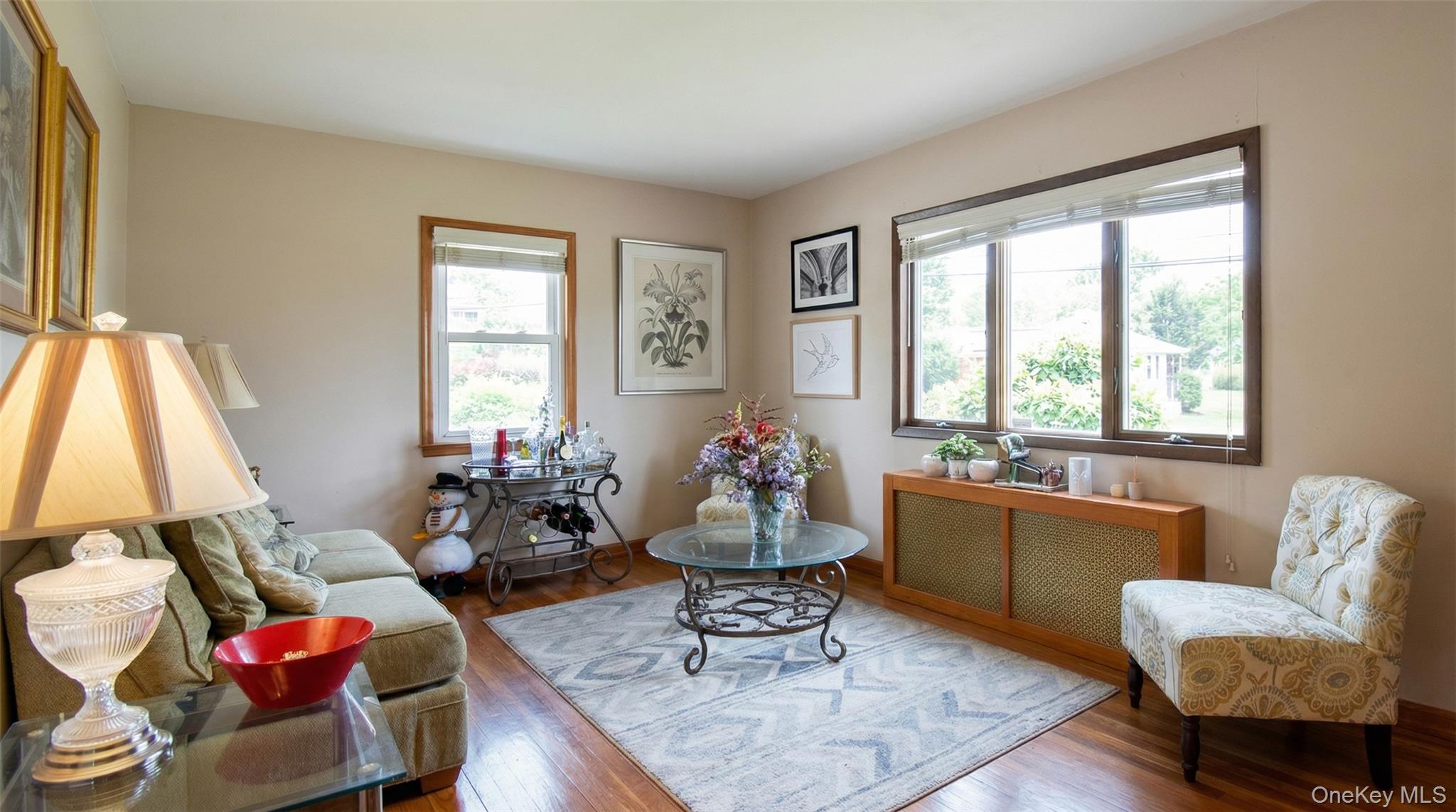 6 Sullivan Road Farmingdale, NY 11735 - Photo 4 of 21 a living room with furniture and a large window