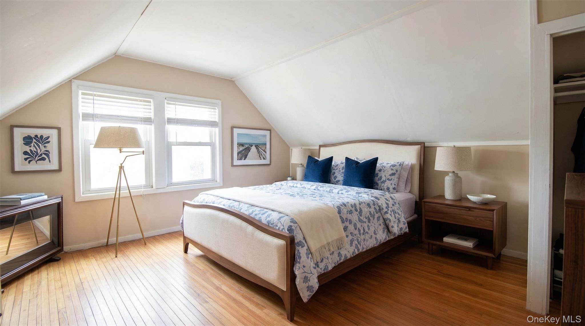 6 Sullivan Road Farmingdale, NY 11735 - Photo 10 of 21 a bedroom with a bed and a large window