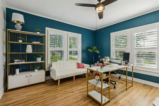 a living room with furniture and a window