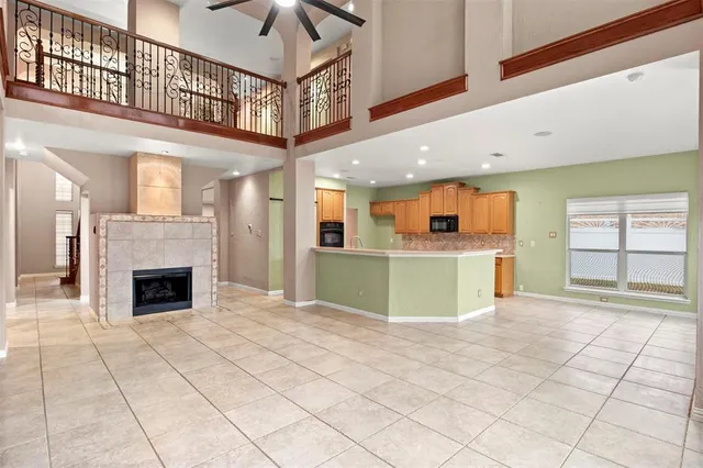a view of a kitchen with kitchen and a fireplace windows
