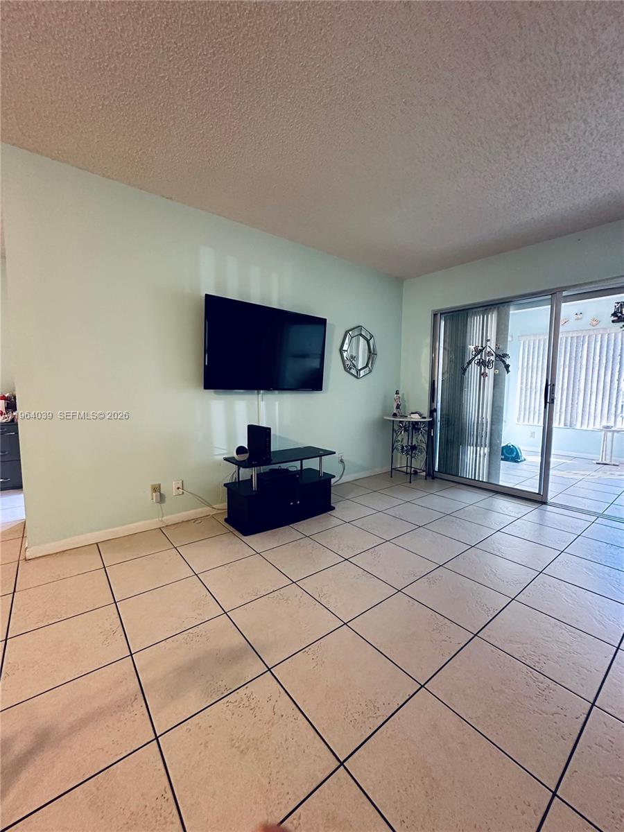 5260 Nesting Way, Unit B Delray Beach, FL 33484 - Photo 3 of 9 a view of room with furniture