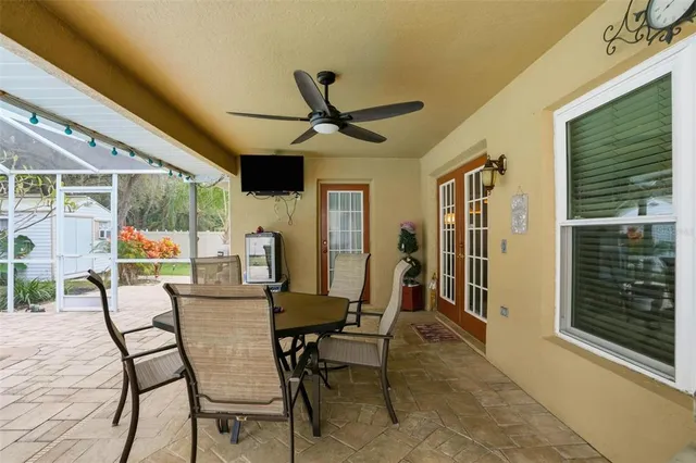 a dining room with furniture and window