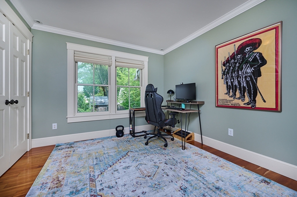 25 Union Street, Unit 2 Northampton, MA 01060 - Photo 25 of 38 a view of a workspace with furniture and a window