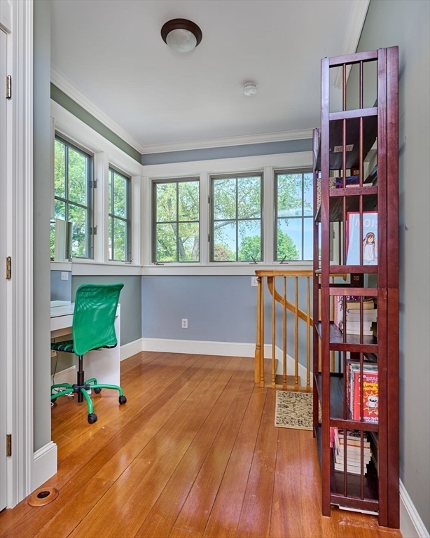 25 Union Street, Unit 2 Northampton, MA 01060 - Photo 27 of 38 a view of a livingroom with furniture bookshelf and a window