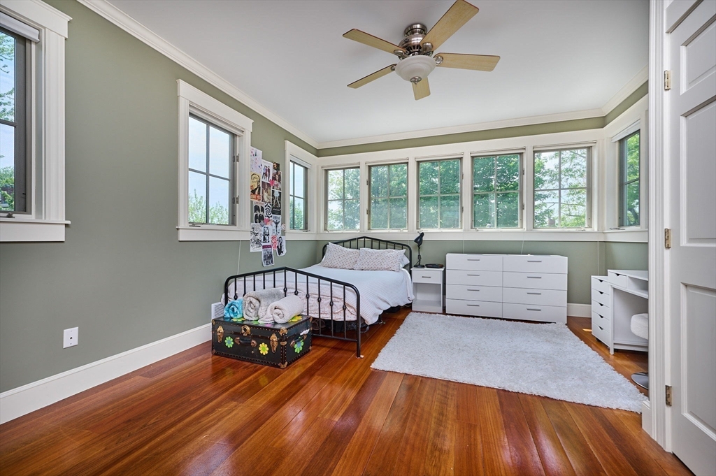 25 Union Street, Unit 2 Northampton, MA 01060 - Photo 29 of 38 a living room with a bed furniture and a window