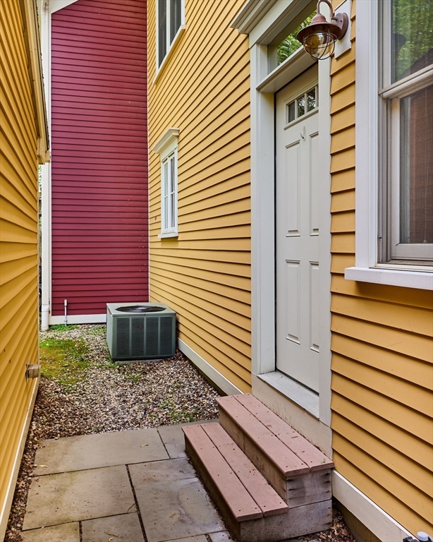 25 Union Street, Unit 2 Northampton, MA 01060 - Photo 34 of 38 a front view of a house with a yard