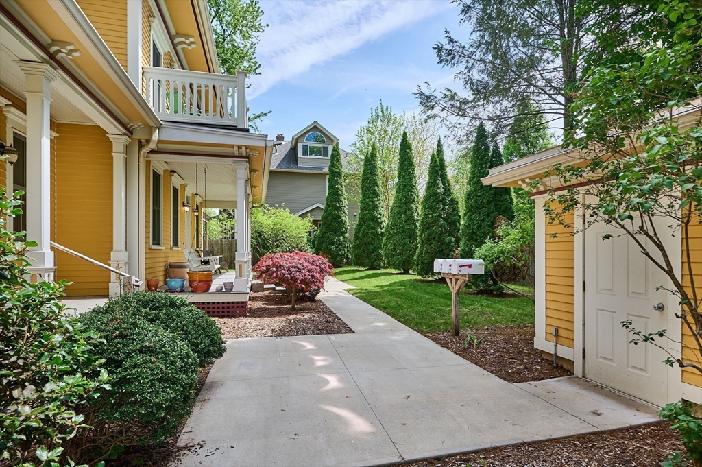 25 Union Street, Unit 2 Northampton, MA 01060 - Photo 5 of 38 a view of a house with a yard and potted plants