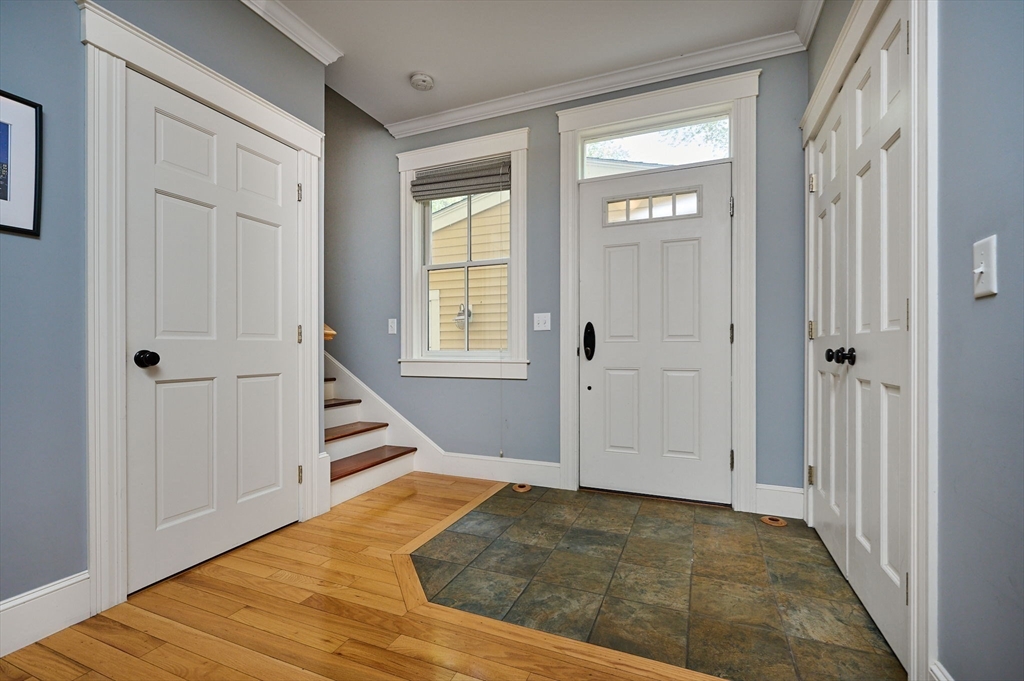 25 Union Street, Unit 2 Northampton, MA 01060 - Photo 8 of 38 a view of an entryway with wooden floor and staircase
