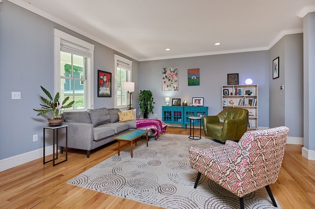 25 Union Street, Unit 2 Northampton, MA 01060 - Photo 9 of 38 a living room with furniture and a wooden floor