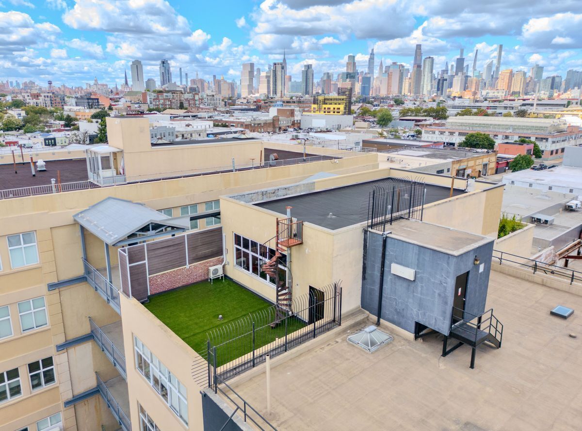 231 Norman Avenue, Unit 511 Brooklyn, NY 11222 - Photo 2 of 30 a view of a kitchen with kitchen and utility
