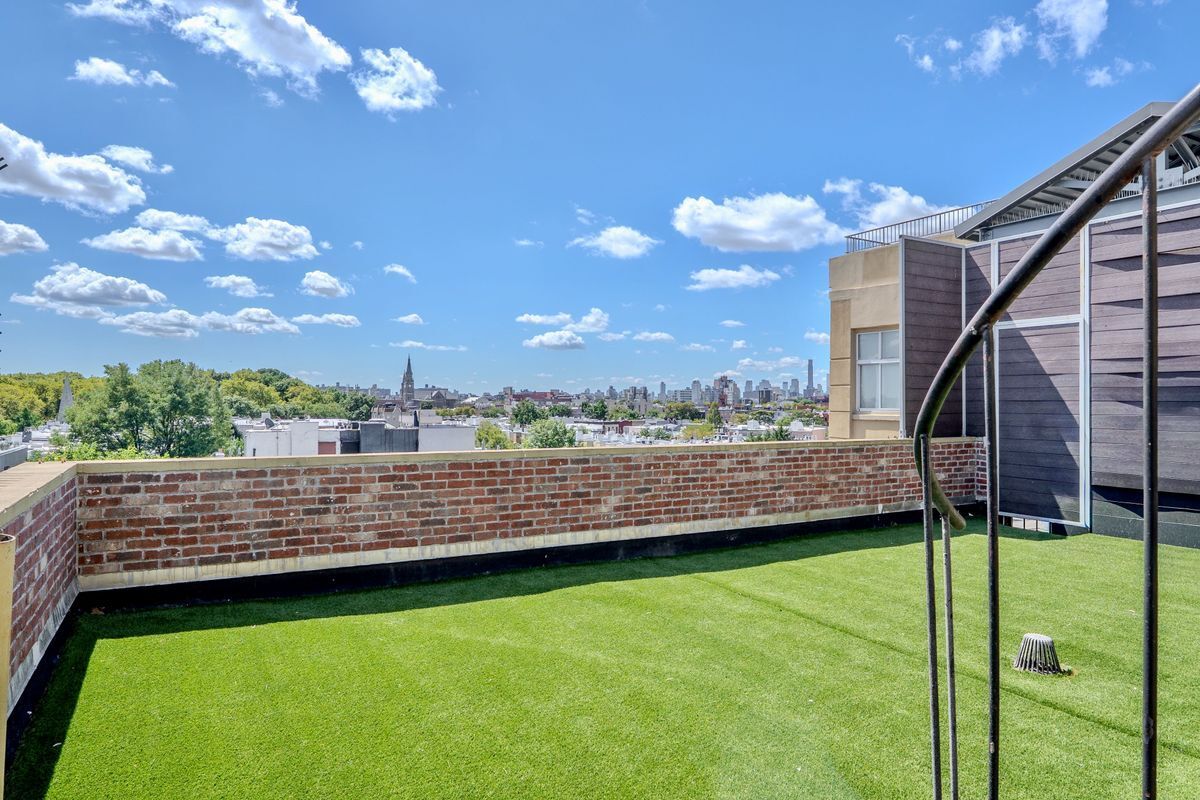 231 Norman Avenue, Unit 511 Brooklyn, NY 11222 - Photo 6 of 30 a view of a balcony with yard