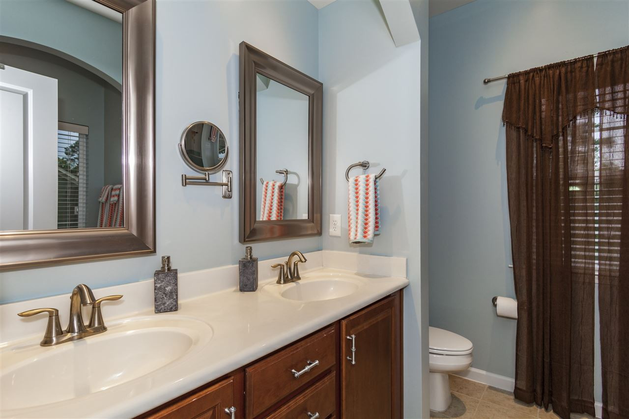 1434 Van Page Boulevard Raleigh, NC 27607 - Photo 17 of 25 This master bathroom features double sinks, a garden tub, and shower! Master Bathroom