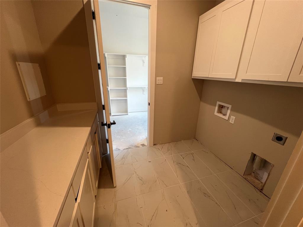 1053 Llano Way Poolville, TX 76487 - Photo 21 of 26 a view of walk in closet