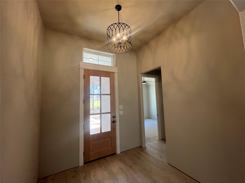 1053 Llano Way Poolville, TX 76487 - Photo 9 of 26 a view of livingroom with window