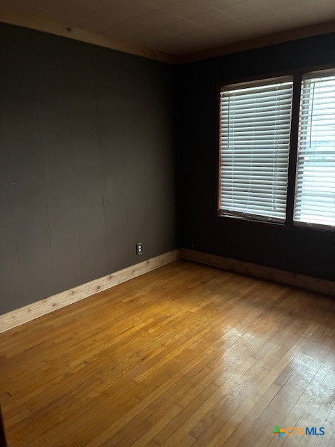 209 Highland Street Yoakum, TX 77995 - Photo 5 of 10 a view of empty room with window