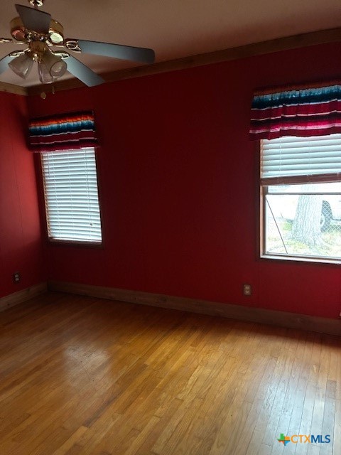 209 Highland Street Yoakum, TX 77995 - Photo 6 of 10 an empty room with a window