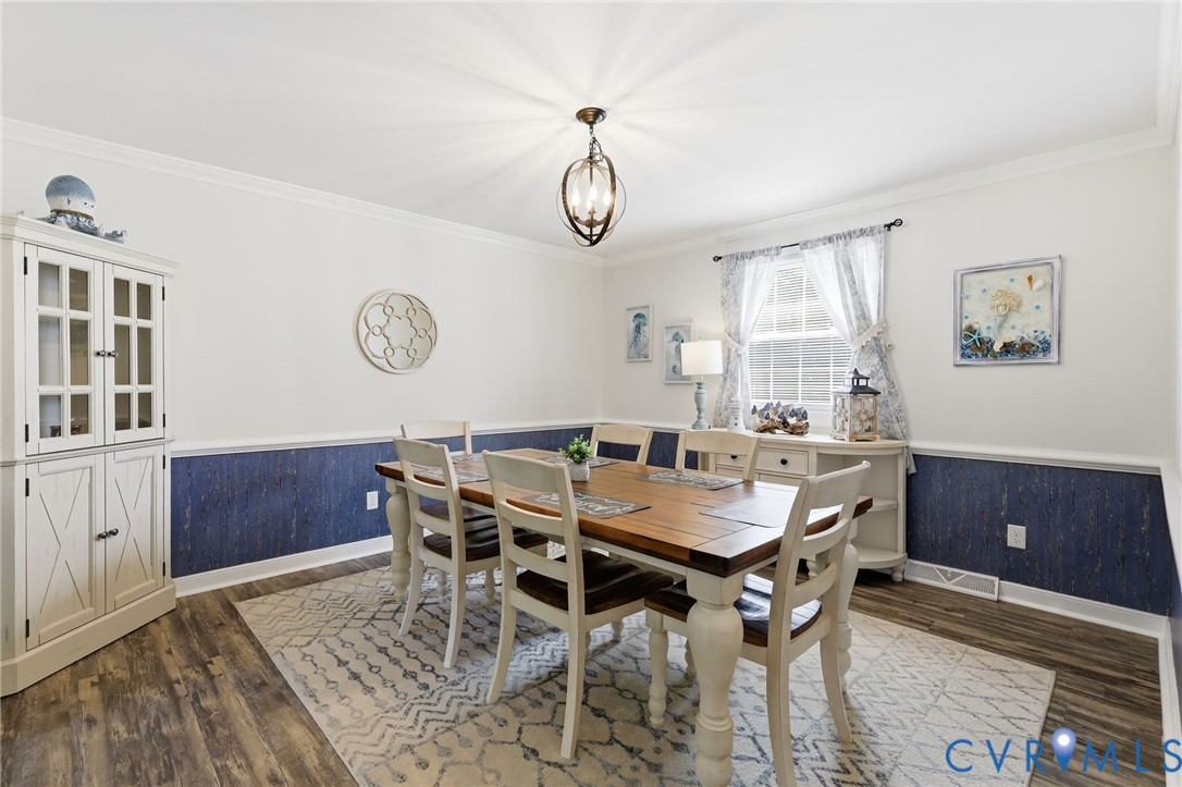 11200 Surry Road Chester, VA 23831 - Photo 14 of 48 a view of a dining room with furniture