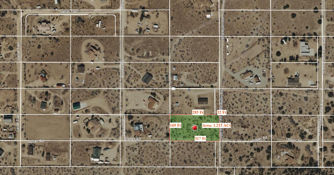 a bathroom with a glass door and a shower