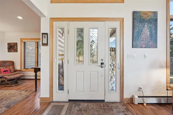 a view of a livingroom with furniture and storage area