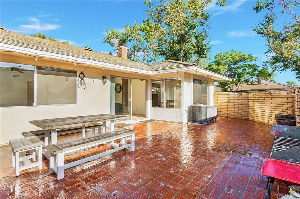 17241 Candleberry Irvine, CA 92612 - Photo 20 of 24 a front view of a house with garden