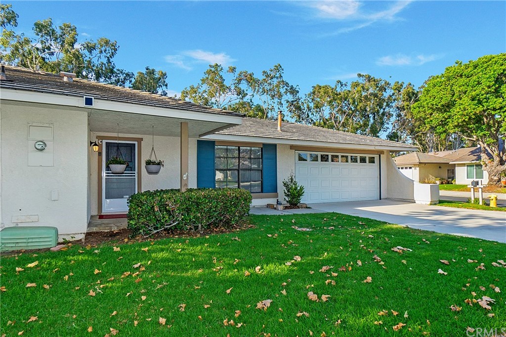17241 Candleberry Irvine, CA 92612 - Photo 2 of 24 front view of a house with a yard