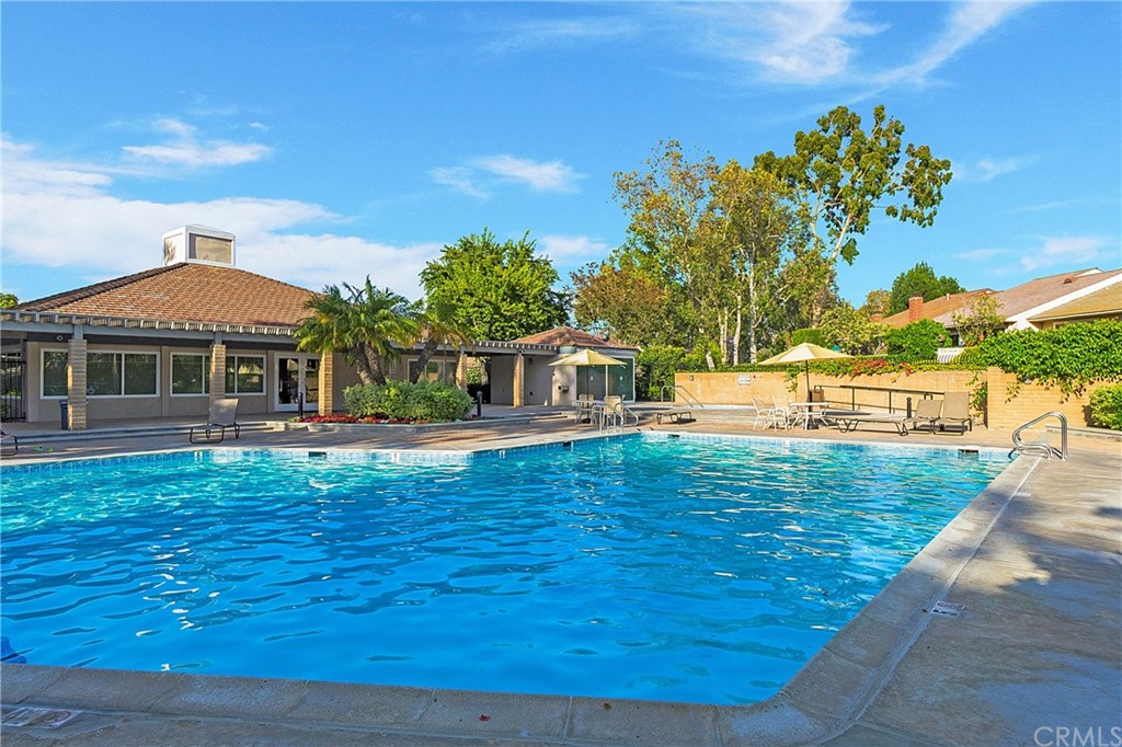 17241 Candleberry Irvine, CA 92612 - Photo 23 of 24 a view of a house with a yard