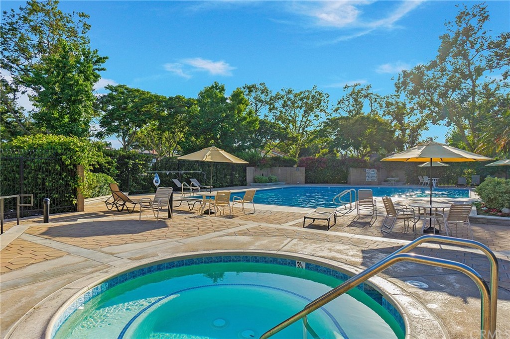 17241 Candleberry Irvine, CA 92612 - Photo 24 of 24 a view of a swimming pool with an outdoor space and seating area