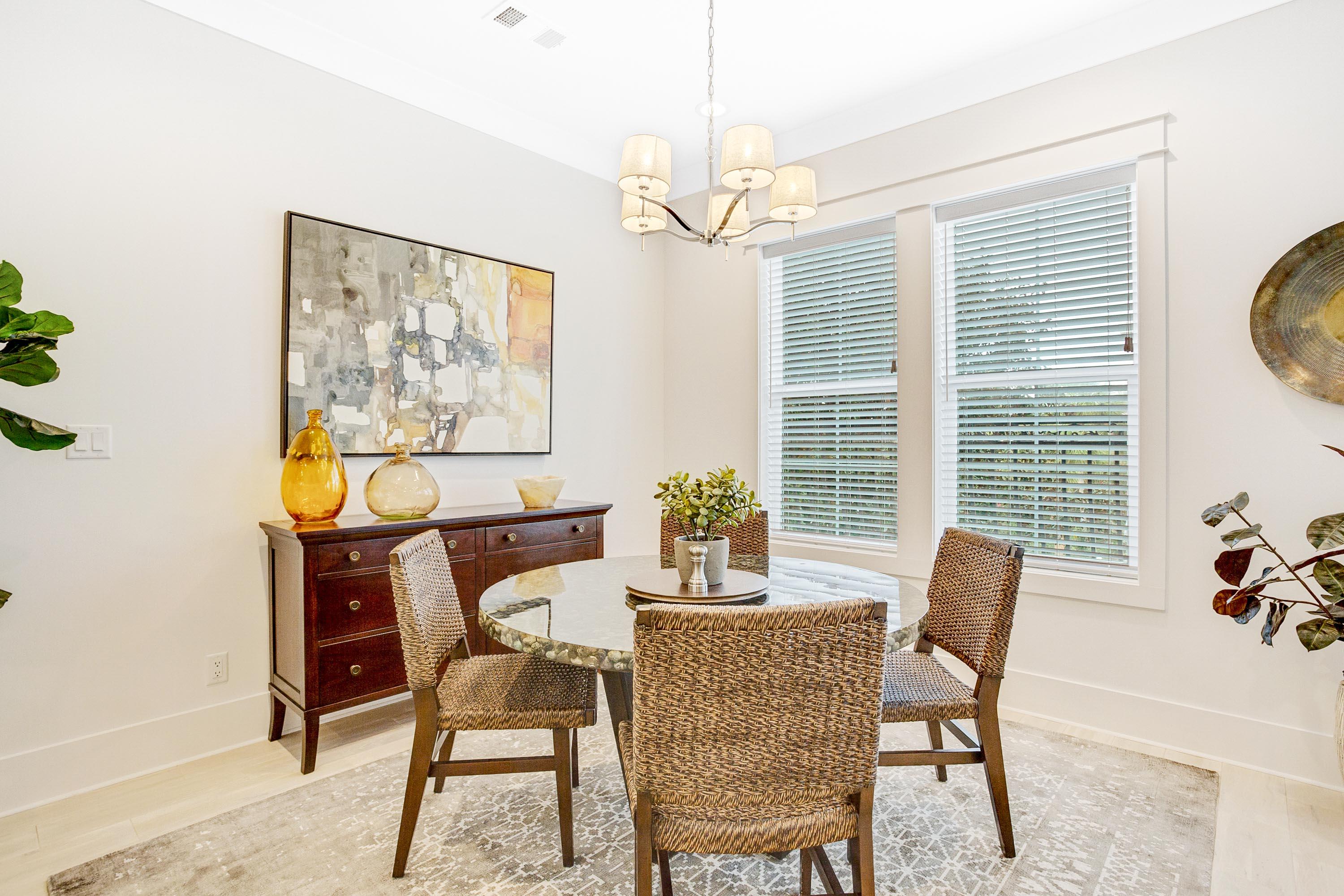 4795 Ocean Boulevard Destin, FL 32541 - Photo 15 of 43 a dining room with furniture and window