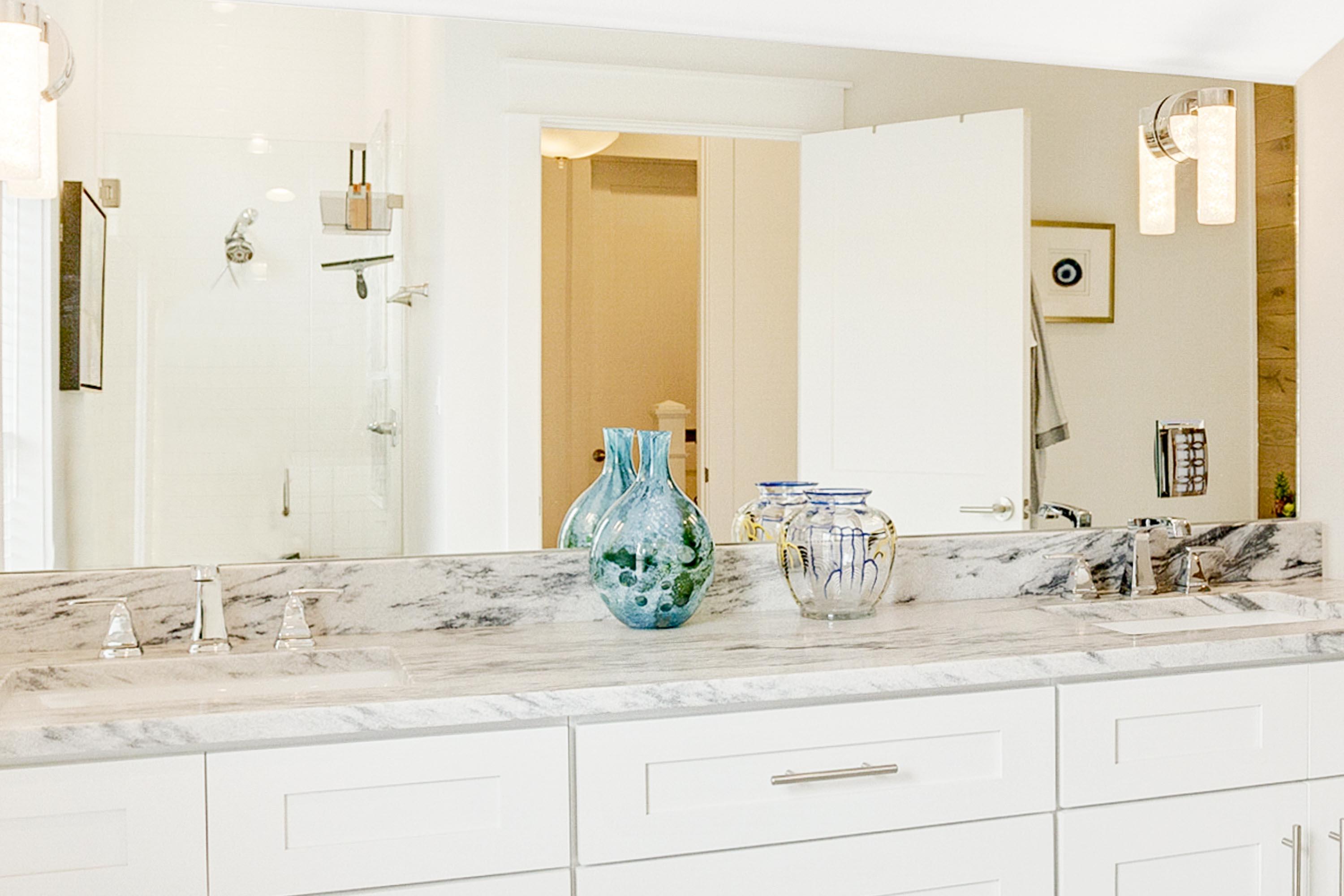 4795 Ocean Boulevard Destin, FL 32541 - Photo 19 of 43 a bathroom with a sink and a mirror