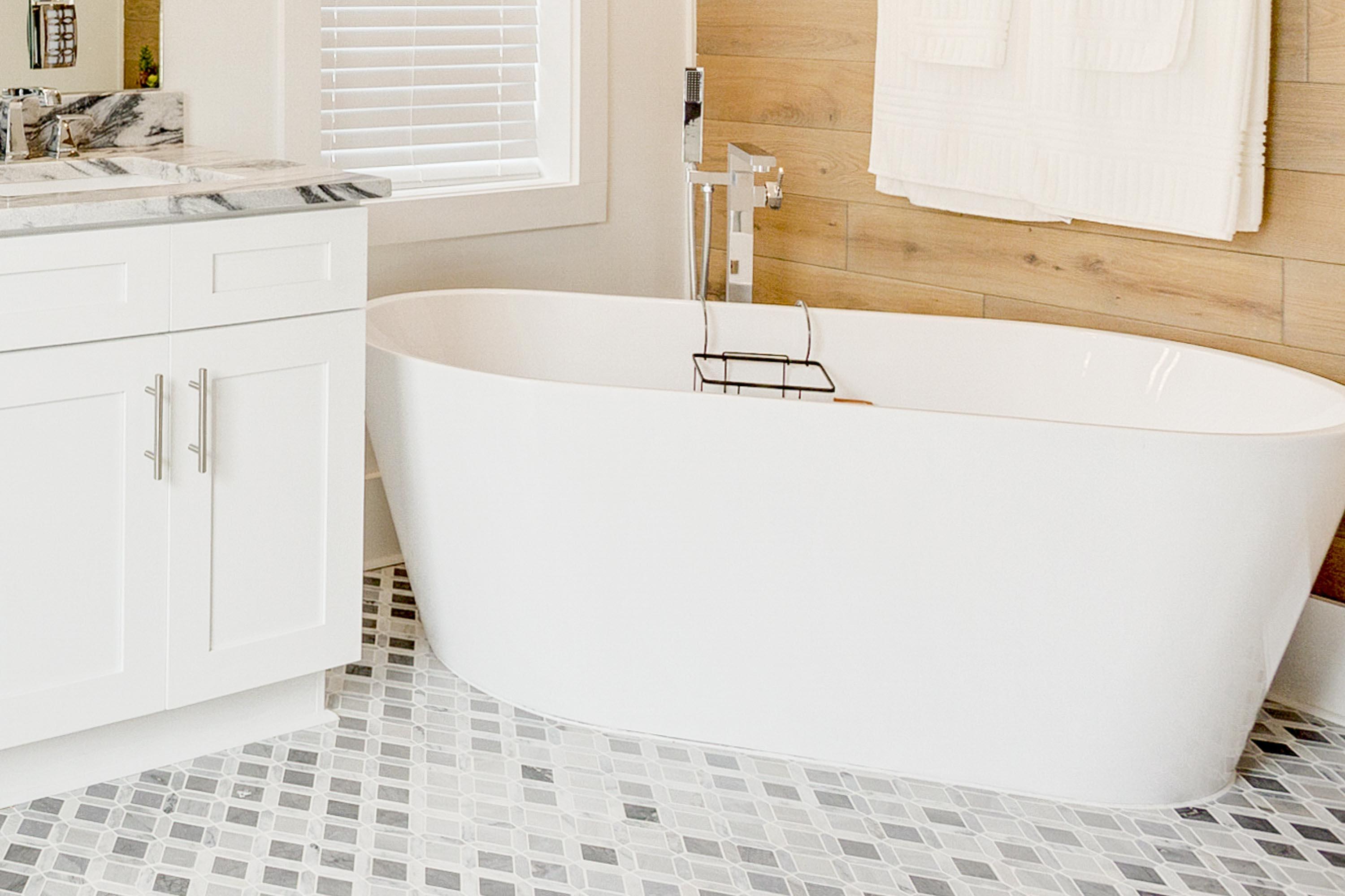 4795 Ocean Boulevard Destin, FL 32541 - Photo 20 of 43 a bathroom with a sink and a bathtub