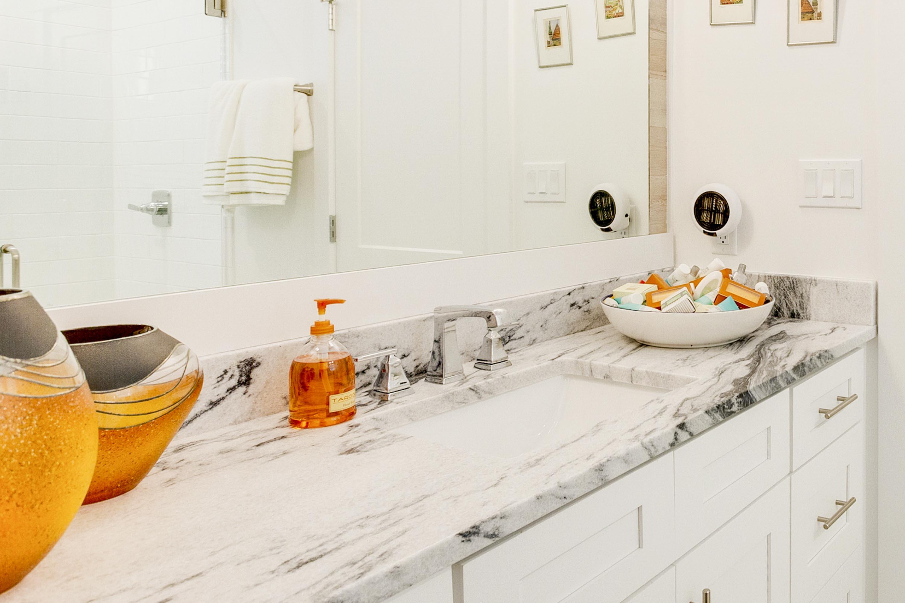 4795 Ocean Boulevard Destin, FL 32541 - Photo 23 of 43 a bathroom with a granite countertop sink and a mirror