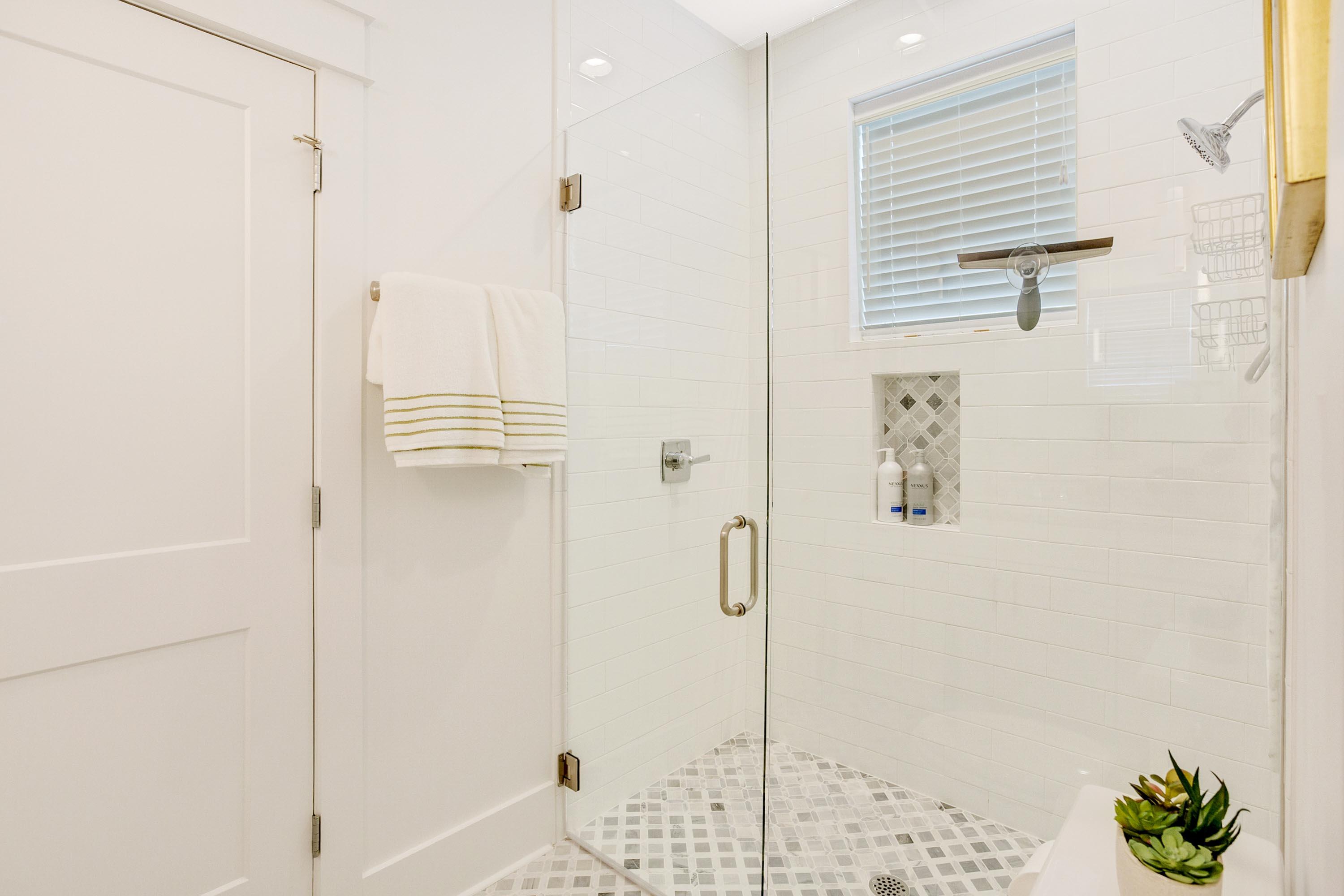 4795 Ocean Boulevard Destin, FL 32541 - Photo 24 of 43 a bathroom with a shower