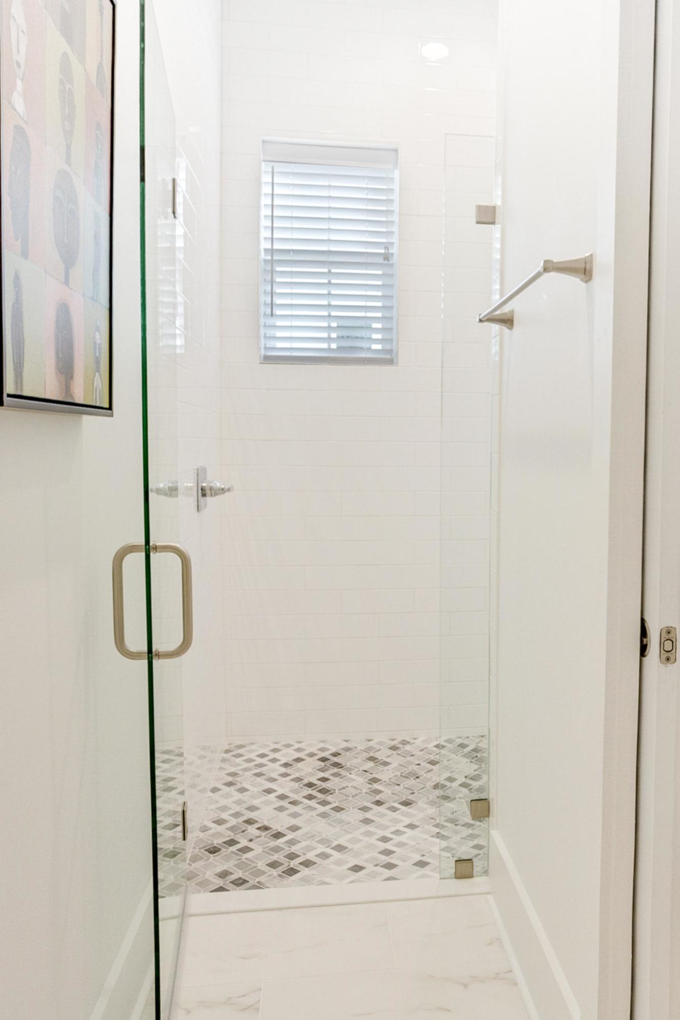 4795 Ocean Boulevard Destin, FL 32541 - Photo 29 of 43 a bathroom with a shower
