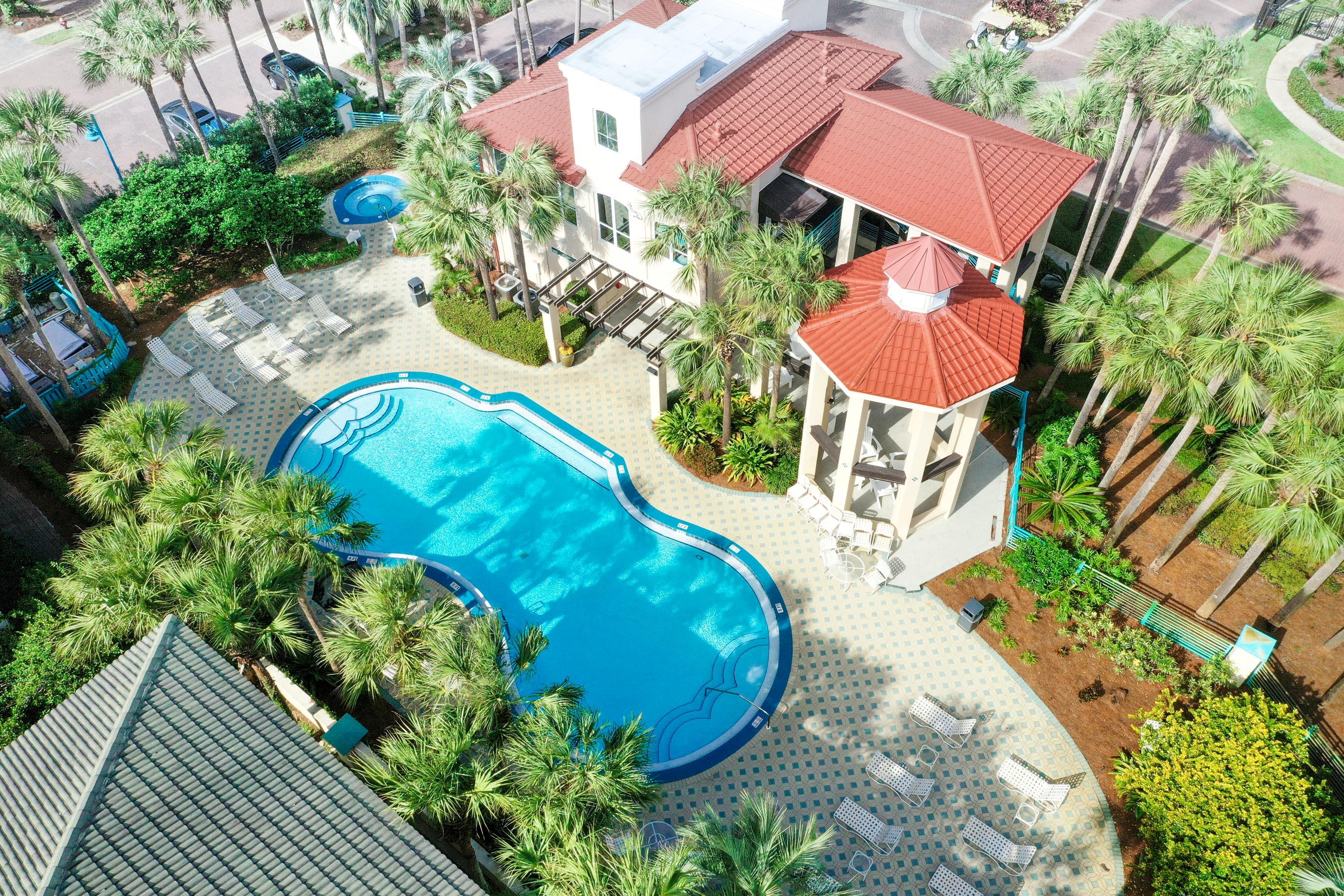 4795 Ocean Boulevard Destin, FL 32541 - Photo 34 of 43 a view of a swimming pool with a yard