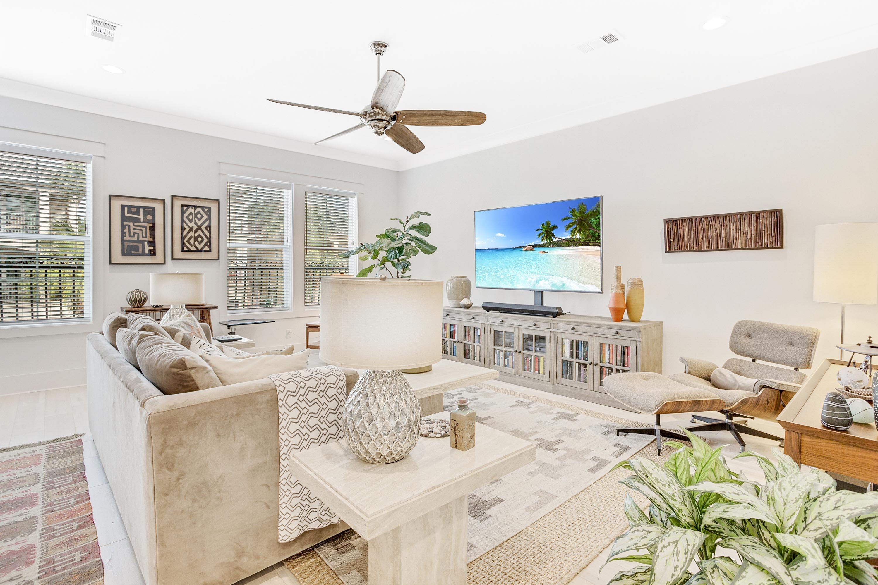 4795 Ocean Boulevard Destin, FL 32541 - Photo 8 of 43 a living room with furniture and a flat screen tv