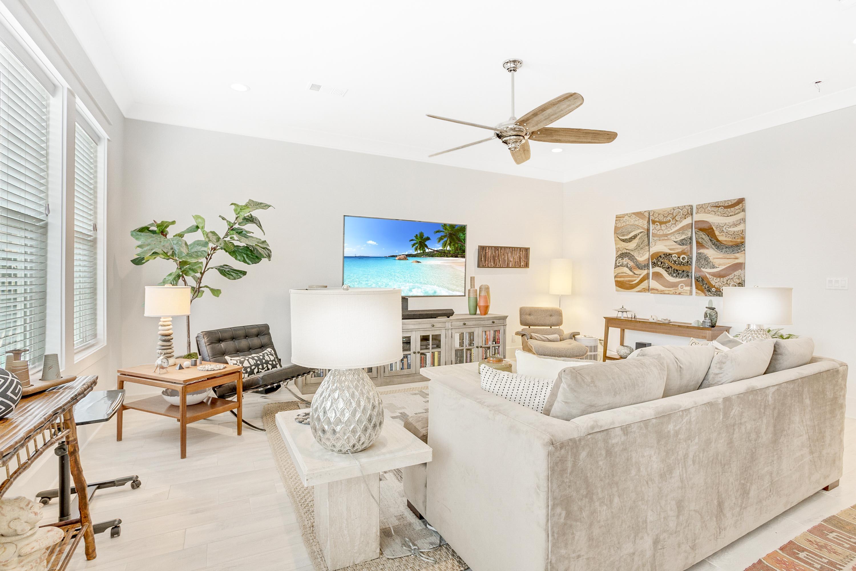 4795 Ocean Boulevard Destin, FL 32541 - Photo 9 of 43 a living room with furniture and a potted plant