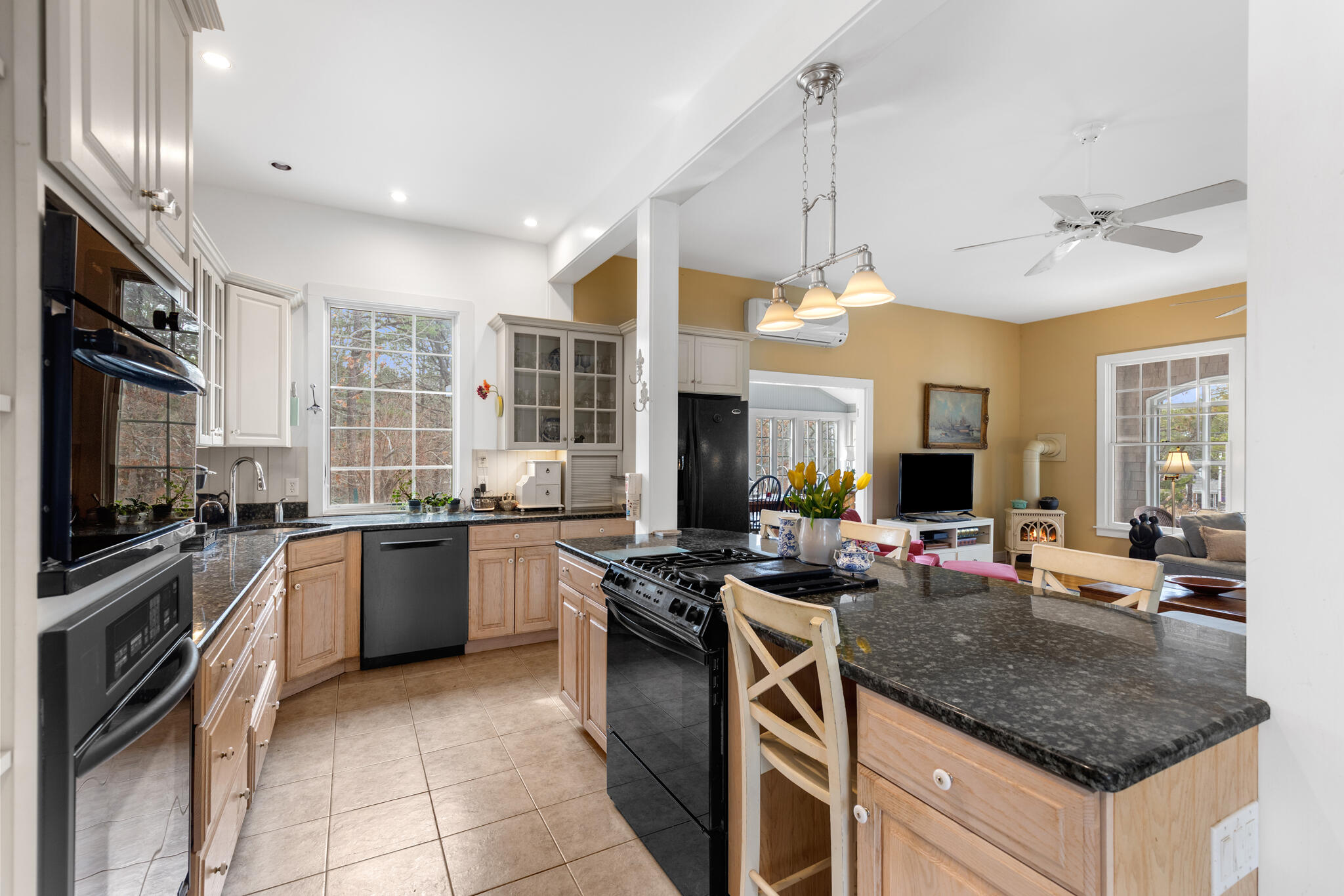311 South Sunken Meadow Road Eastham, MA 02642 - Photo 10 of 57 a kitchen with stainless steel appliances granite countertop a stove oven and a sink